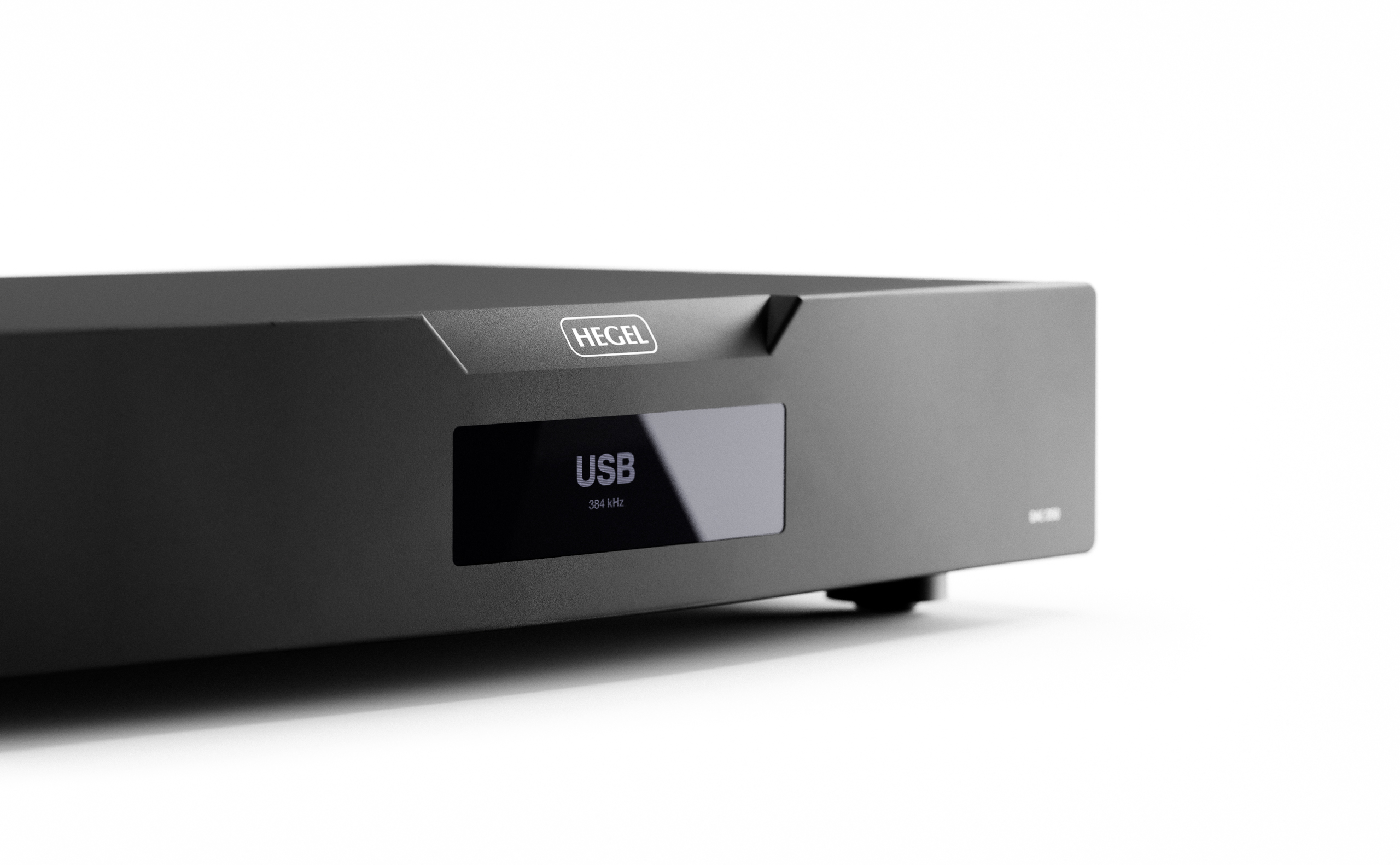 Close-up of a HEGEL audio component showing the brand on the front panel with a USB display screen.
